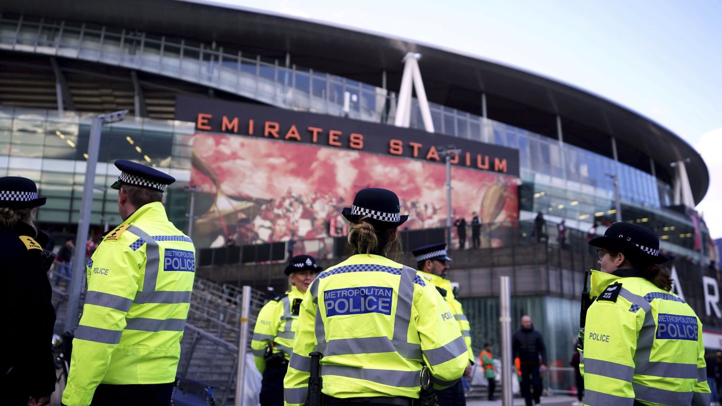 Police stand outside the stadium ahead of the Champions League quarterfinal between Arsenal and Bayern Munich.