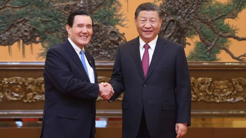 Chinese leader Xi Jinping shakes hands with former Taiwan president Ma Ying-jeou at the Great Hall of the People in Beijing on April 10, 2024.