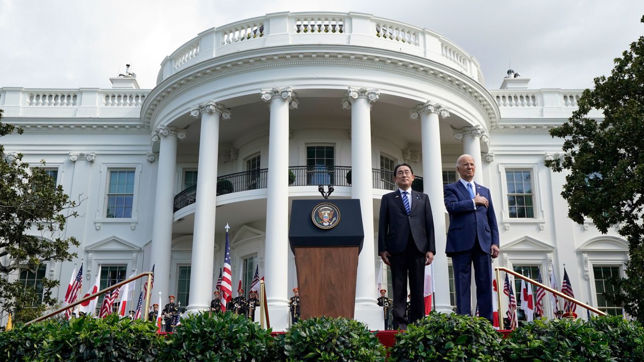 President Joe Biden and Japanese Prime Minister Fumio Kishida listen to the National Anthem during a State Arrival Ceremony on the South Lawn of the White House, Wednesday, April 10, 2024, in Washington. (AP Photo/Alex Brandon)