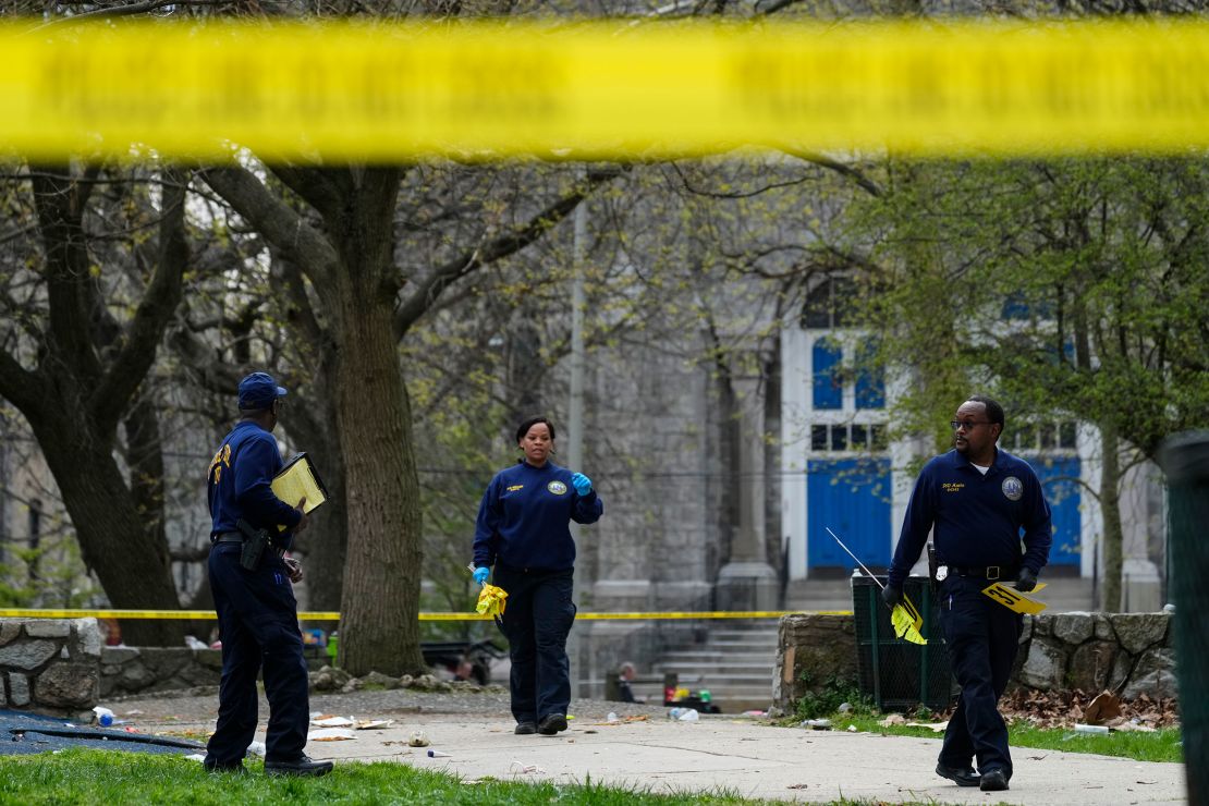 Investigators work the scene of the shooting in Philadelphia, Wednesday, April 10, 2024.