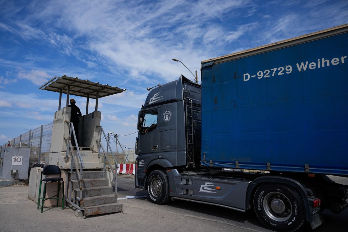 A truck carrying humanitarian aid for the Gaza Strip passes through the Kerem Shalom Crossing in southern Israel last March.