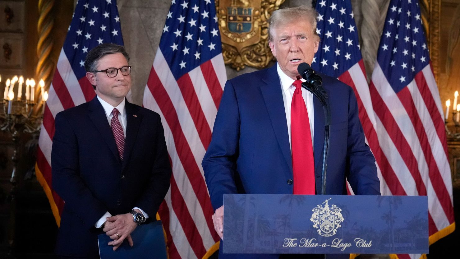 Republican presidential candidate former President Donald Trump speaks as Speaker of the House Mike Johnson, R-La., listens during a news conference, Friday, April 12, 2024, at Mar-a-Lago in Palm Beach, Fla. (AP Photo/Wilfredo Lee)