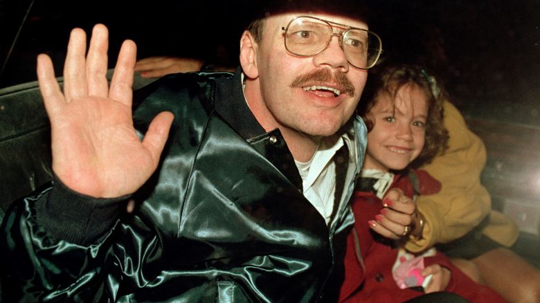 Terry Anderson, who was the longest held American hostage in Lebanon, grins with his 6-year-old daughter Sulome, Dec. 4, 1991, as they leave the U.S. Ambassador's residence in Damascus, Syria, following Anderson's release.