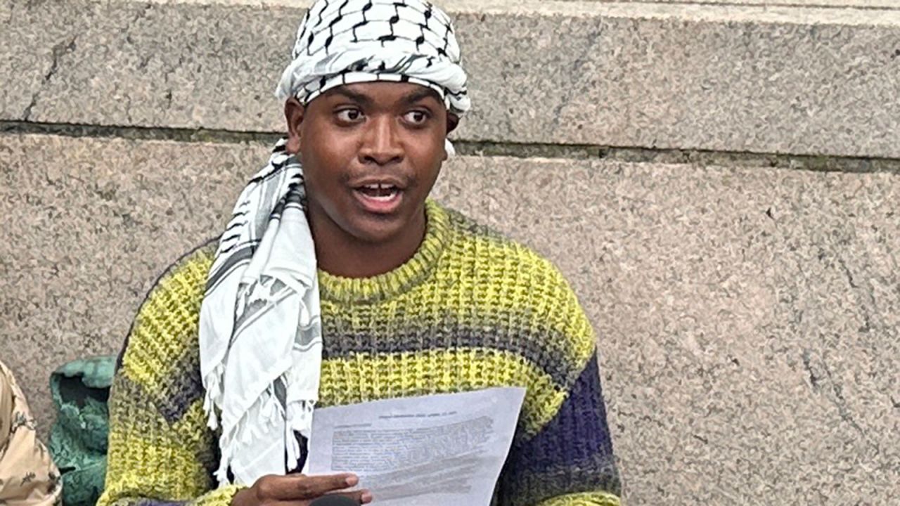 Demonstration leader Khymani James address the media outside a tent camp on the campus of Columbia University in New York on Wednesday, April 24, 2024.