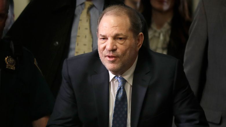 FILE - Harvey Weinstein arrives at a Manhattan courthouse for jury deliberations in his rape trial, Monday, Feb. 24, 2020, in New York. New York's highest court has overturned Harvey Weinstein's 2020 rape conviction and ordered a new trial. (AP Photo/Seth Wenig, File)