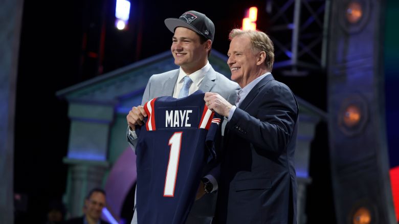 North Carolina quarterback Drake Maye poses after being chosen by the New England Patriots with the third overall pick during the first round of the NFL football draft on Thursday, April 25, 2024 in Detroit. (Adam Hunger/AP Images for the NFL)