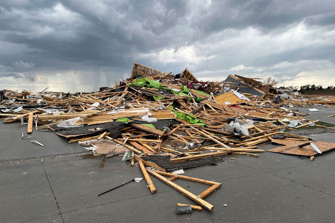 Debris is seen from a destroyed home northwest of Omaha, Nebraska, after a storm tore through the area on Friday.