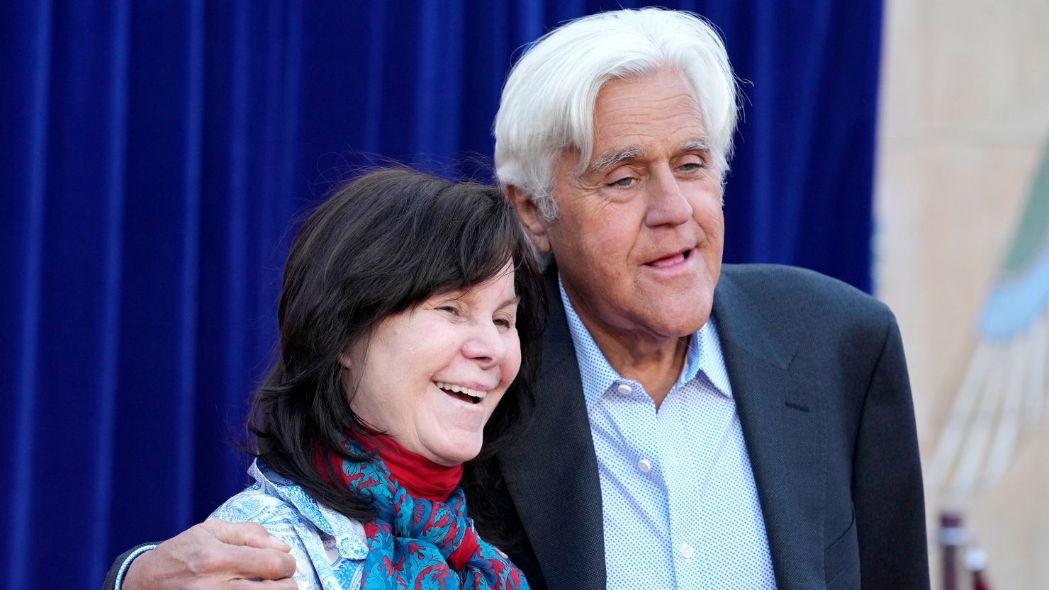 Jay Leno, right, and his wife Mavis pose together at the premiere of the Netflix film "Unfrosted" at the Egyptian Theatre on Tuesday.