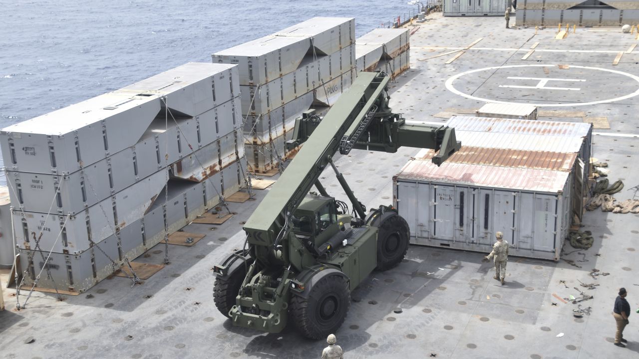 In this image provided by the U.S. Army, soldiers assigned to the 7th Transportation Brigade (Expeditionary) and sailors attached to the MV Roy P. Benavidez assemble the Roll-On, Roll-Off Distribution Facility (RRDF), or floating pier, off the shore of Gaza on April 26, 2024. The U.S. expects to have on-the-ground arrangements in Gaza ready for humanitarian workers to start delivering aid this month via a new U.S.-backed sea route for Gaza aid. An official with the U.S. Agency for International Development tells the AP that humanitarian groups expect to have their part of preparations complete by early to mid-month. (U.S. Army via AP)