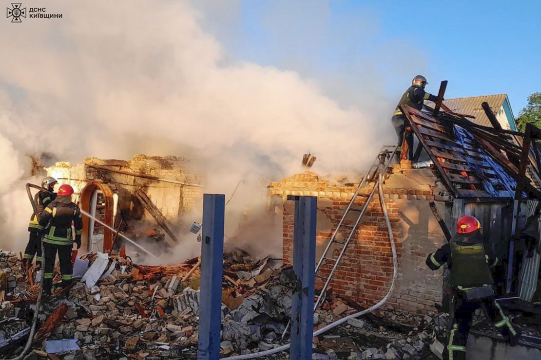 Rescuers assess the ruins of a building, damaged by a Russian missile attack in Kyiv region, Ukraine on May 8, 2024.
