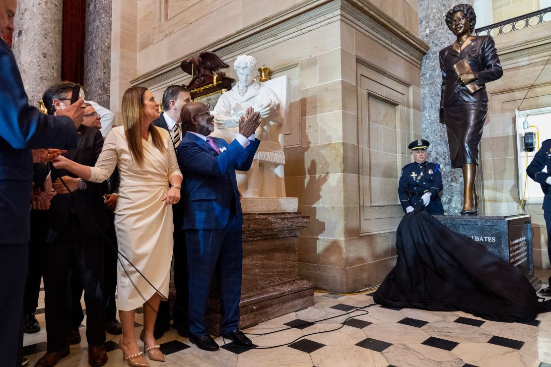 Arkansas Gov. Sarah Huckabee Sanders, left, and Charles King, president of the Daisy Bates House Museum Foundation board, at the unveiling of a statue of civil rights leader Daisy Bates, of Arkansas, Wednesday, May 8, 2024, at Statuary Hall on Capitol Hill in Washington.