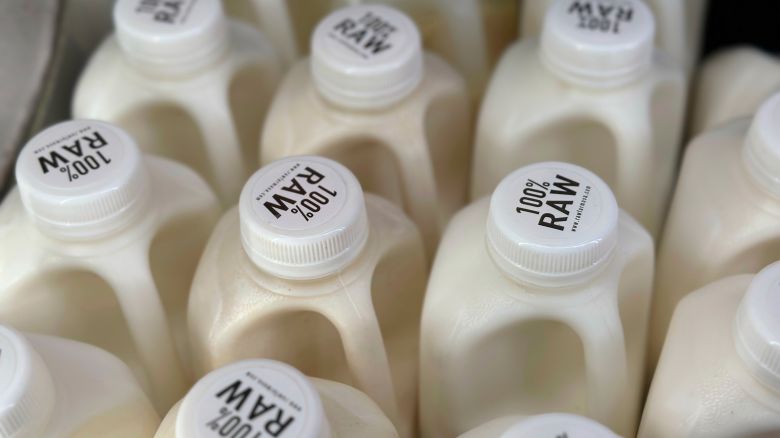 Bottles of raw milk are displayed for sale at a store in Temecula, Calif., on Wednesday, May 8, 2024. (AP Photo/JoNel Aleccia)