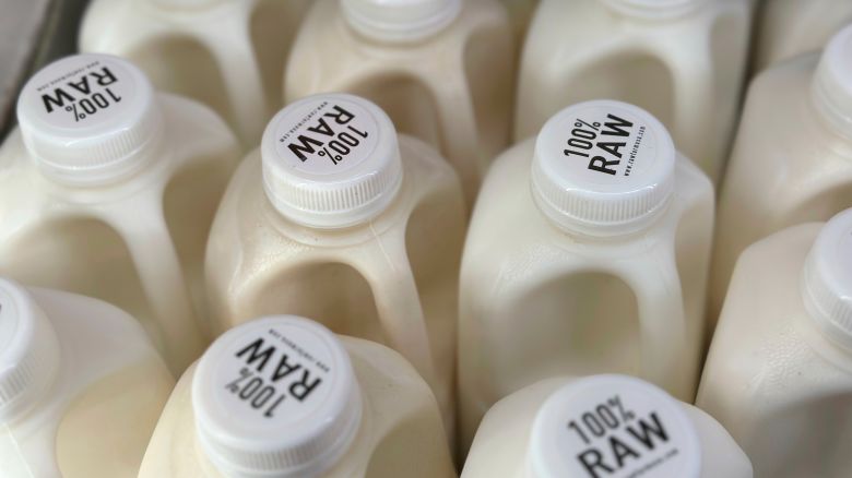 Bottles of raw milk are displayed for sale at a store in Temecula, Calif., on Wednesday, May 8, 2024. (AP Photo/JoNel Aleccia)