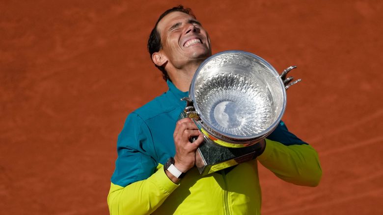 FILE - Spain's Rafael Nadal lifts the trophy after winning the final match against Norway's Casper Ruud in three sets, 6-3, 6-3, 6-0, at the French Open tennis tournament in Roland Garros stadium in Paris, France, Sunday, June 5, 2022. (AP Photo/Christophe Ena, File)
