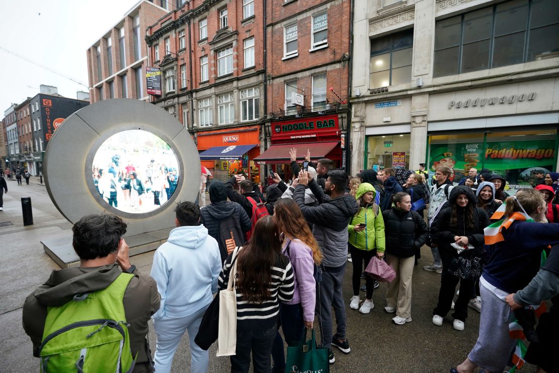 People view the live stream between Dublin and New York, in Dublin, Ireland, on May 13.