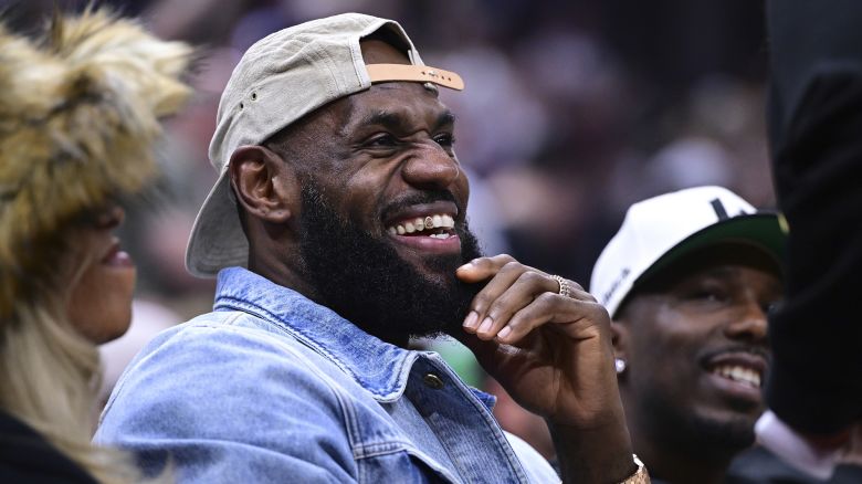 Los Angeles Lakers forward LeBron James smiles during the first half of Game 4 of an NBA basketball second-round playoff series between the Cleveland Cavaliers and Boston Celtics, Monday, May 13, 2024, in Cleveland. (AP Photo/David Dermer)