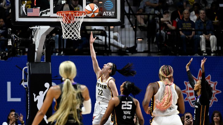 Indiana Fever guard Caitlin Clark scores her first WNBA regular season basket against during a game against the Connecticut Sun in Uncasville, Connecticut on Tuesday, May 14, 2024.