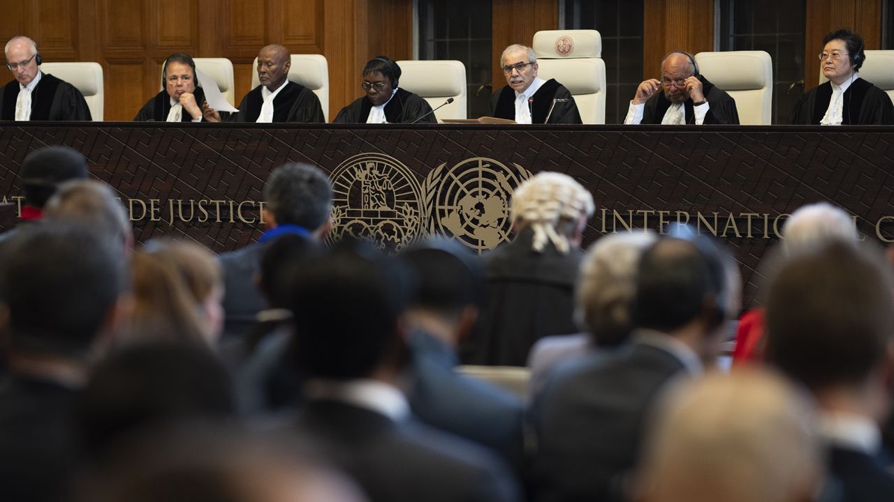Presiding judge Nawaf Salam, third from right, opens the hearings at the International Court of Justice, in The Hague, Netherlands, Thursday, May 16, 2024. The U.N.'s top court opened two days of hearings in a case brought by South Africa to see whether Israel needs to take additional measures to alleviate the suffering in war-ravaged Gaza. (AP Photo/Peter Dejong)