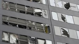 Blown out windows on a high-rise downtown Houston building are shown in the aftermath of a severe thunderstorm on Friday.