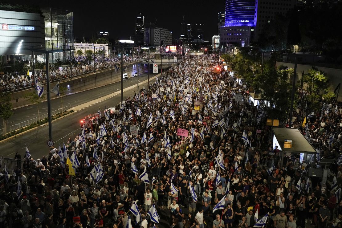 People protest against Netanyahu's government in Tel Aviv.