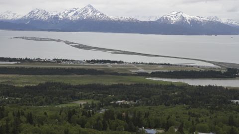 Homer, Alaska, and the Homer Spit, jutting out into Kachemak Bay, is seen on June 9, 2021. Alaska State Troopers say a 70-year-old Homer man attempting to take photos of newborn moose calves was attacked and killed by the calves' mother in Homer on Sunday, May 19, 2024. (AP Photo/Mark Thiessen)