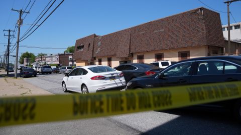 Police tape cordons off the scene of a fatal shooting at Delaware County Linen in Chester, Pennsylvania, on Wednesday. (AP Photo/Matt Rourke)