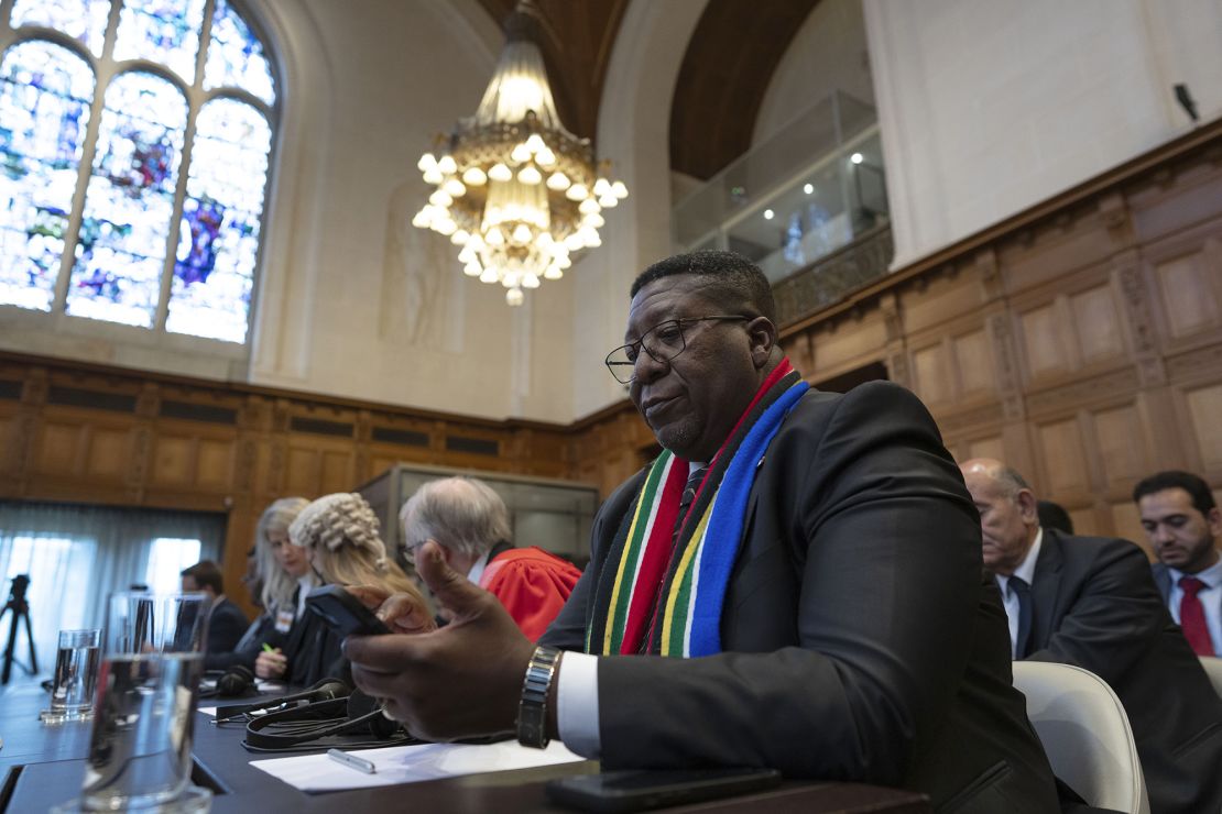Ambassador of the Republic of South Africa to the Netherlands, Vusimuzi Madonsela, waits for judges to enter the International Court of Justice in The Hague, Netherlands on Friday.