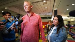 Bryan Hagerich, with his wife, Ashley, after arriving at Pittsburgh International Airport on Friday.