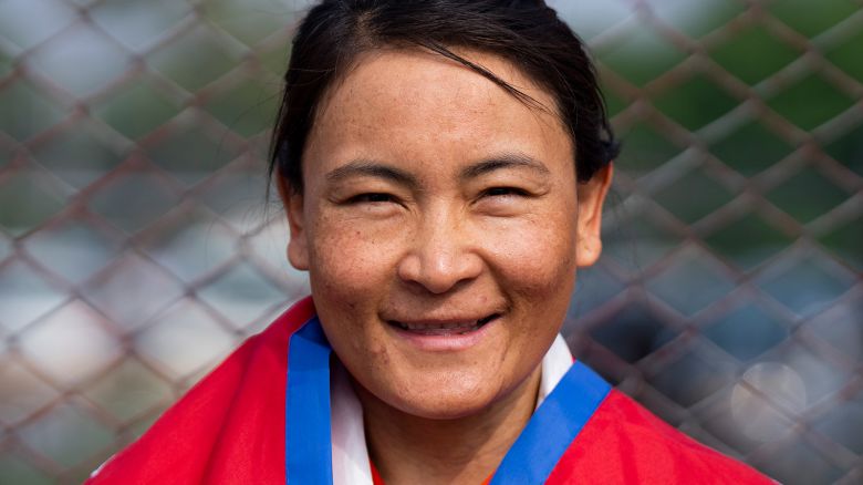 Phunjo Lama who became the fastest female to scale the Everest arrives at airport in Kathmandu, Nepal, Sunday, May 26, 2024.