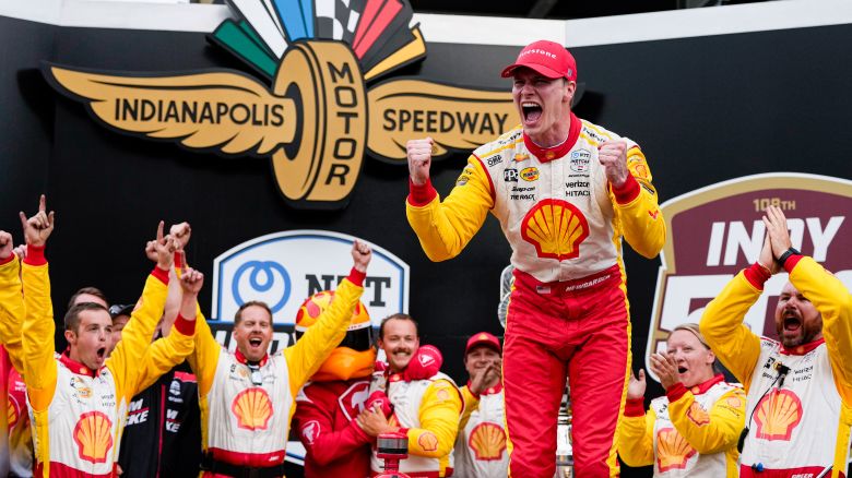 Josef Newgarden celebrates after winning the Indianapolis 500 auto race at Indianapolis Motor Speedway in Indianapolis, Sunday, May 26, 2024. (AP Photo/Michael Conroy)