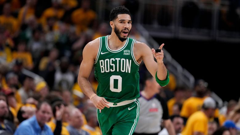 Boston Celtics forward Jayson Tatum reacts after making a basket during the second half of Game 4 of the NBA Eastern Conference basketball finals against the Indiana Pacers, Monday, May 27, 2024, in Indianapolis. (AP Photo/Michael Conroy)