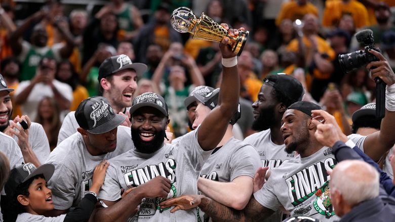Boston Celtics guard Jaylen Brown, center, celebrates with his teammates after Game 4 of the NBA Eastern Conference basketball finals against the Indiana Pacers, Monday, May 27, 2024, in Indianapolis.