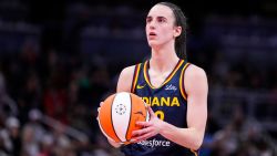 Indiana Fever guard Caitlin Clark (22) plays against the Los Angeles Sparks in the first half of a WNBA basketball game in Indianapolis, Tuesday, May 28, 2024. (AP Photo/Michael Conroy)