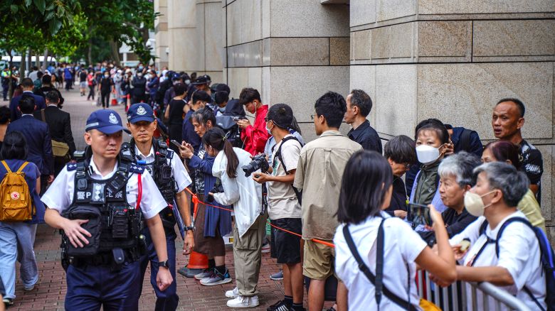 Police officers outside the West Kowloon Magistrates' Courts in Hong Kong, China, on May 30, 2024.