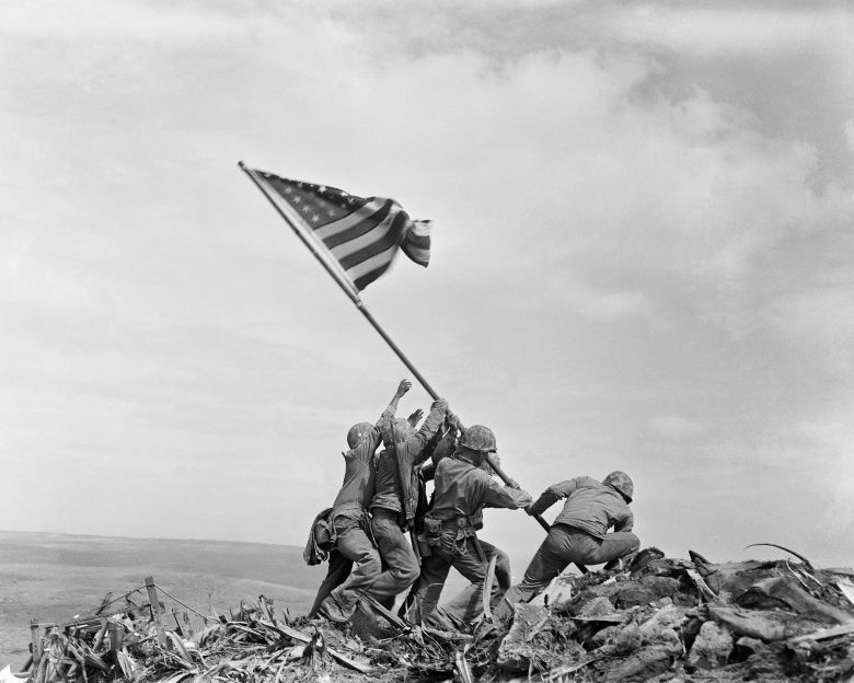 Joe Rosenthal's famous photo showing US Marines raising the American flag atop Mount Suribachi on Iwo Jima in February 1945.