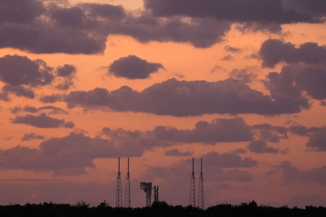 Boeing's Starliner capsule, atop an Atlas V rocket, sits on the launchpad during sunrise ahead of the Saturday launch attempt at Cape Canaveral Space Force Station in Florida.