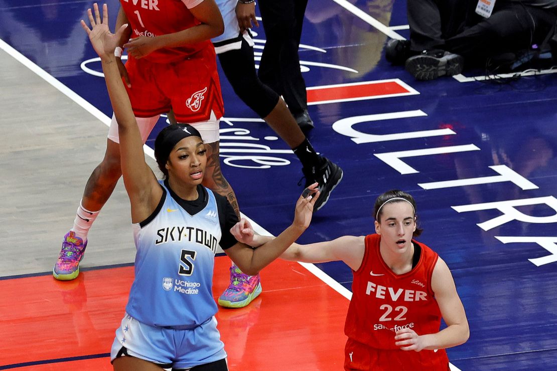 Caitlin Clark guards Angel Reese at Gainbridge Fieldhouse in Indianapolis on June 1.