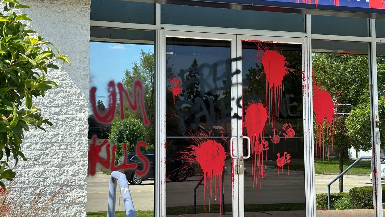 Pro-Palestinian graffiti mars the outside of the Goodman Acker law offices, Monday, June 3, 2024, in Southfield, Mich., just north of Detroit. Southfield police are investigating the vandalism as a hate crime. University of Michigan regent and attorney Jordan Acker called the vandalism "antisemitic." (AP Photo/Corey Williams)