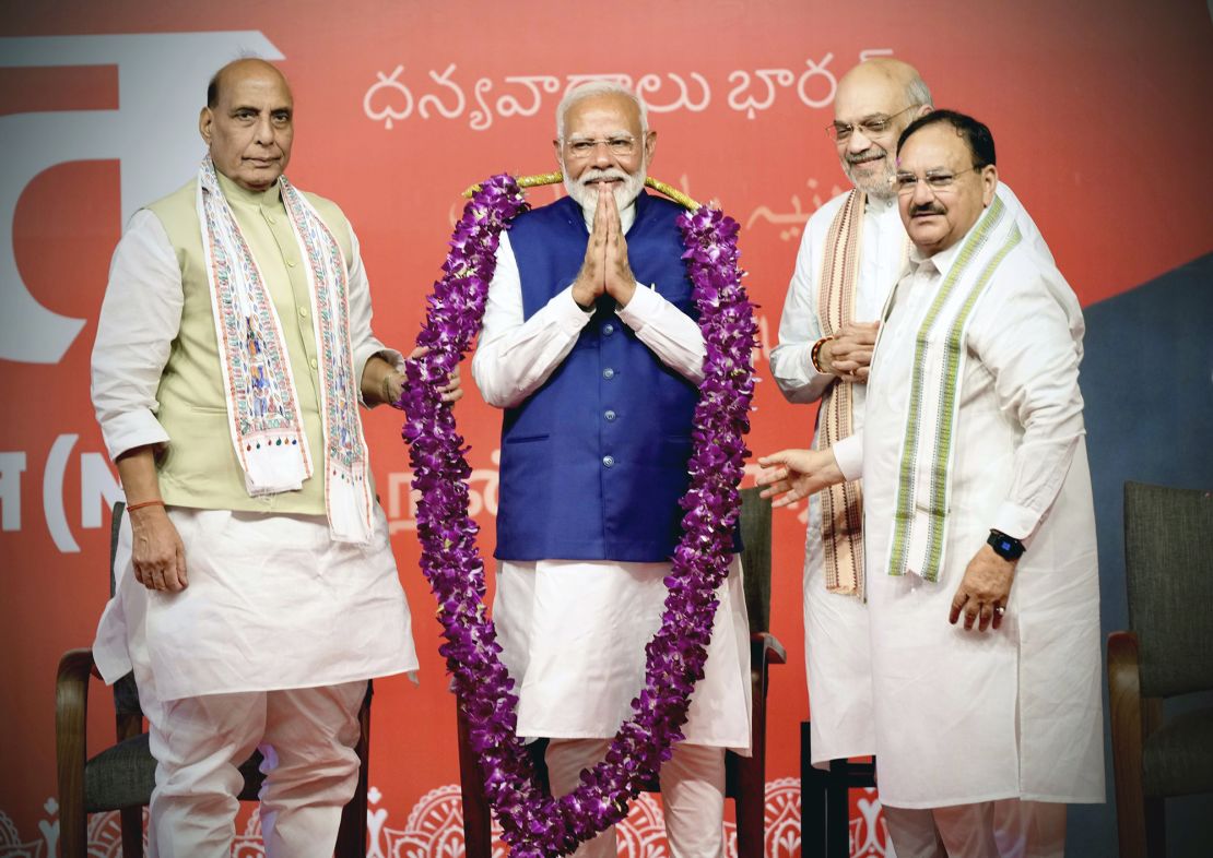 Prime Minister Narendra Modi is garlanded by senior Bharatiya Janata Party leaders in New Delhi, India, Tuesday, June 4, 2024.