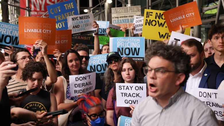 Protesters demonstrate outside New York Gov. Kathy Hochul's Manhattan office in New York on Wednesday, June 5, 2024. Hochul is indefinitely delaying implementation of a plan to charge motorists big tolls to enter the core of Manhattan, just weeks before the nation's first "congestion pricing" system was set to launch.