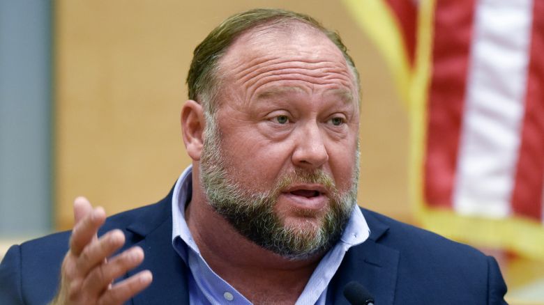 Conspiracy theorist Alex Jones takes the witness stand to testify at the Sandy Hook defamation damages trial at Connecticut Superior Court in Waterbury, Conn., Sept. 22, 2022. Jones asked the court permission on Wednesday, June 5, 2024, to convert his personal bankruptcy reorganization to a liquidation, which would lead to a sell-off of a large portion of his assets to help pay some of the $1.5 billion he owes relatives of victims of the Sandy Hook Elementary School shooting.