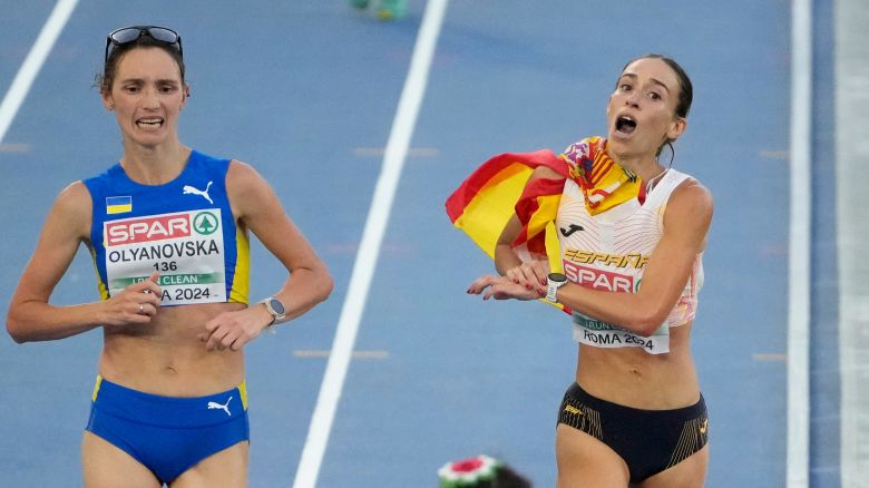 Lyudmila Olyanovska of Ukraine, left, overtakes Laura García-Caro of Spain, right, to win the bronze medal in the women's 20 km race walk at the the European Athletics Championships in Rome, Friday, June 7, 2024.