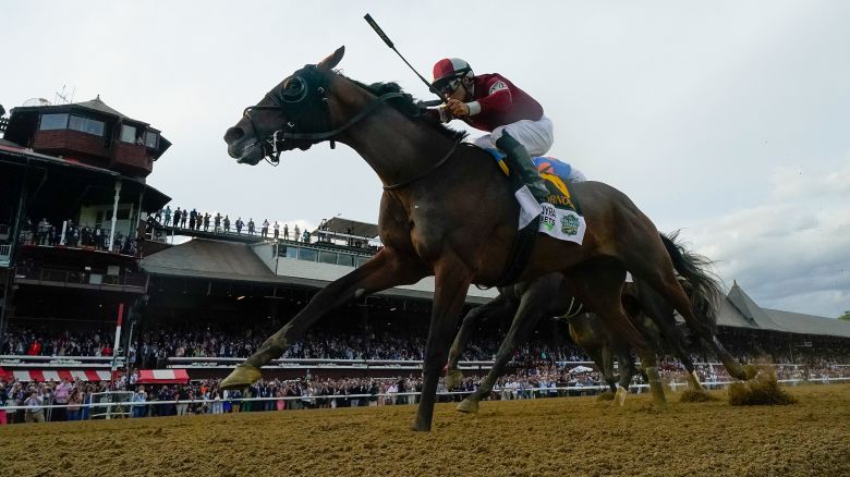 Dornoch, (6), with Luis Saez up, crosses the finish line to win the 156th running of the Belmont Stakes horse race, Saturday, June 8, 2024, in Saratoga Springs, N.Y. (AP Photo/Seth Wenig)