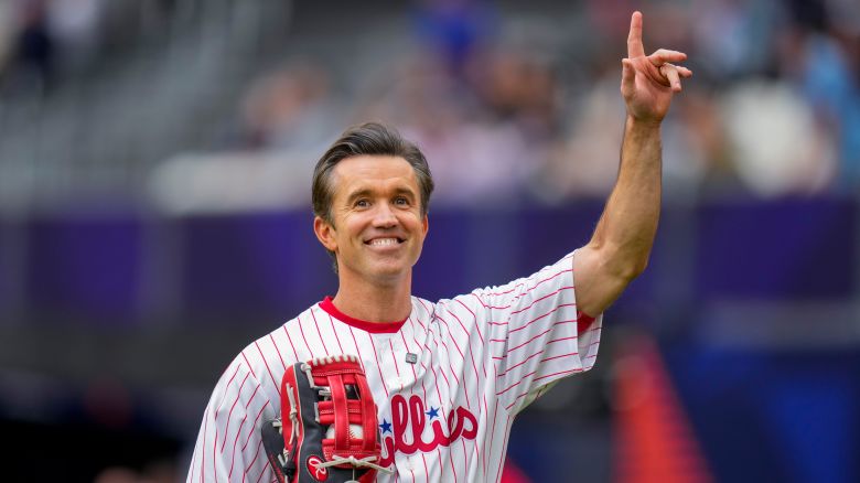 Actor Rob McElhenney acknowledges crowd prior to a London Series baseball game between the New York Mets and the Philadelphia Phillies at The London Stadium, in London, Sunday, June 9, 2024. (AP Photo/Kirsty Wigglesworth)