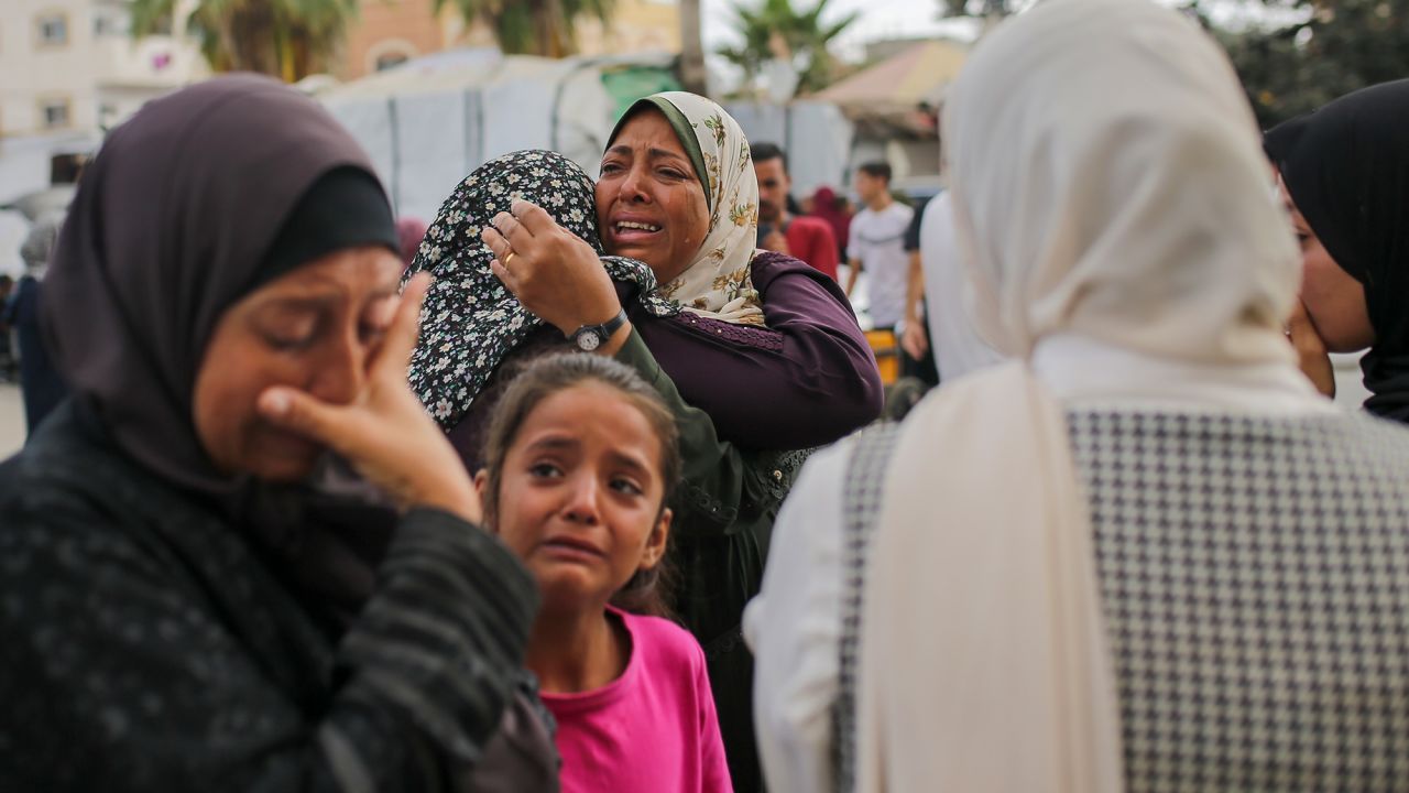 Palestinian women mourn near the bodies of relatives killed in an Israeli airstrike, outside the morgue in Al-Aqsa Martyrs Hospital in Deir al Balah, Gaza, on June 10.