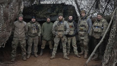 FILE - Soldiers of 12th Special Forces Brigade Azov of the National Guard pose for a photo at the 155mm self-propelled gun M109 Paladin at the front line, near Kreminna, Luhansk region, Ukraine, Sunday, Jan. 28, 2024. The U.S. has removed restrictions on the transfer of American weapons and training to a high-profile Ukrainian military unit with a checkered past, the State Department said on Tuesday, June 11, 2024.  (AP Photo/Efrem Lukatsky, File)