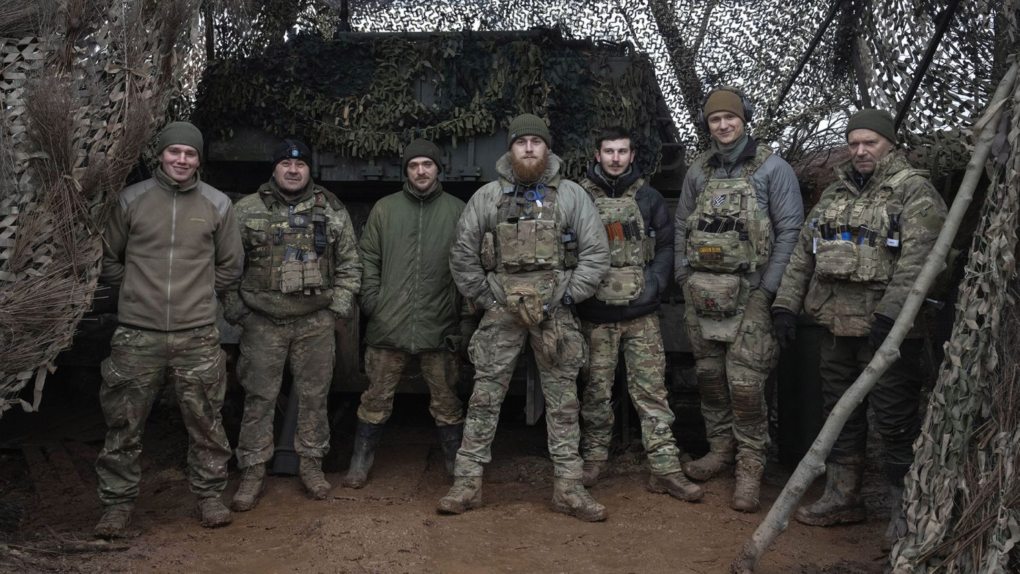 Soldiers of 12th Special Forces Brigade Azov stand in front of a 155mm self-propelled gun on the frontline near Kreminna, Luhansk region, Ukraine, on Jan. 28, 2024.