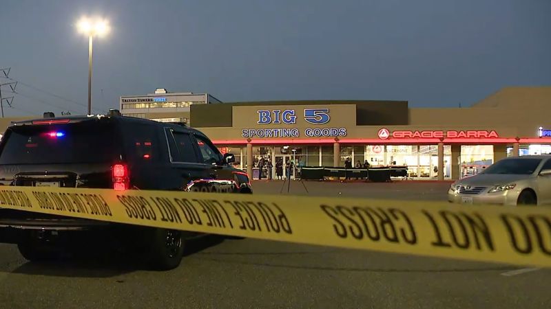 Teens went to a sporting goods store to return airsoft guns. An armed man fatally shot one in the back, authorities say