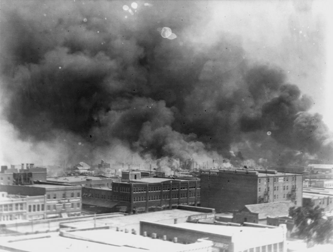 FILE - In this 1921 image provided by the Library of Congress, smoke rises over Tulsa, Oklahoma. The Oklahoma Supreme Court rejected, Wednesday June 12, 2024, the trial of the last two survivors of the Tulsa racial massacre in 1921, thus dashing hope. racial justice advocates that the government would undo one of the worst acts of violence against black people in U.S. history. (Alvin C. Krupnick Co./Library of Congress via AP, file)