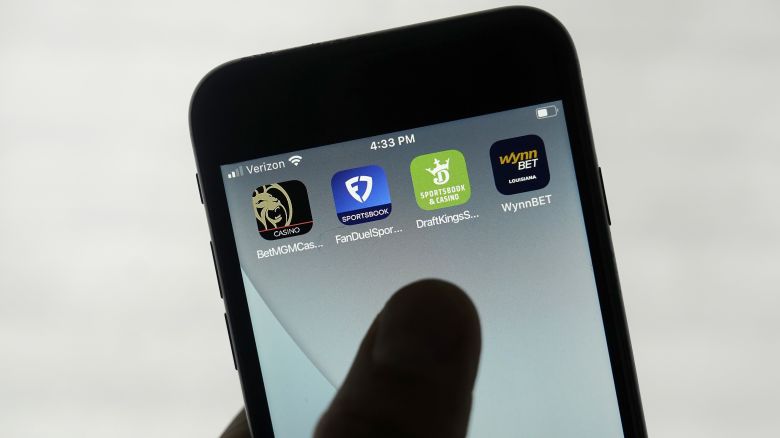 FILE - FanDuel, DraftKings and other online gambling apps are displayed on a phone in San Francisco, Sept. 26, 2022. (AP Photo/Jeff Chiu, File)